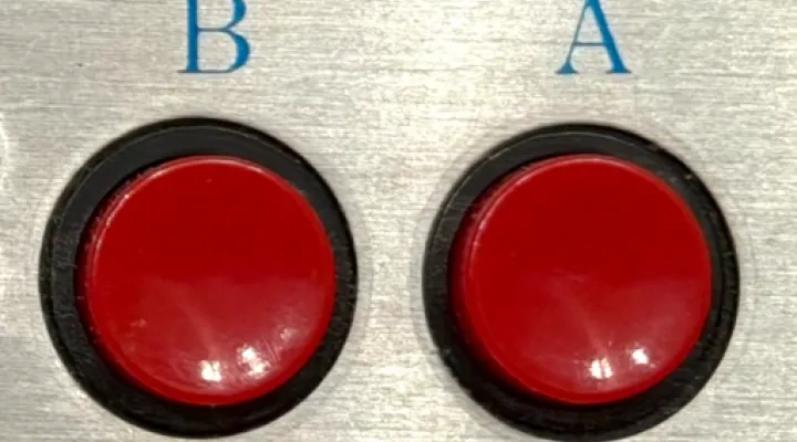 Close-up detail of the mystery Malaysian gamepad buttons.