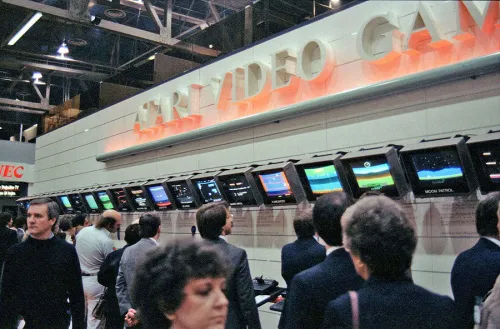 Moon Patrol (right) displayed among other games being exhibited by Atari at CES &rsquo;83. Photo from former GCC employee Steve Szymanski&rsquo;s archive.