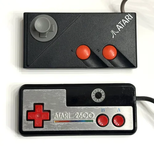 Comparison photo showing an original CX78 Atari gamepad on top, and this mystery gamepad at bottom. Author photo.