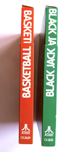 Basketball and Black Jack boxes for the Atari 2600 - Revealing boxes sliding out of cardboard sleeves, side view