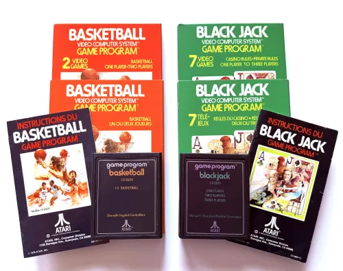 Basketball and Black Jack boxes for the Atari 2600 - Revealing boxes sliding out of cardboard sleeves, with manuals and cartridges